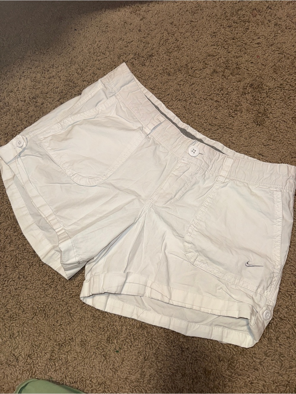 Vintage Nike Women’s White Athletic Shorts with Subtle Swoosh